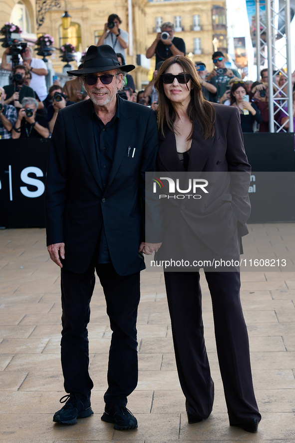 Monica Bellucci and Tim Burton arrive at the Maria Cristina Hotel during the 72nd San Sebastian International Film Festival in San Sebastian...