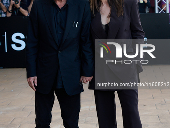 Monica Bellucci and Tim Burton arrive at the Maria Cristina Hotel during the 72nd San Sebastian International Film Festival in San Sebastian...