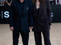 Monica Bellucci and Tim Burton arrive at the Maria Cristina Hotel during the 72nd San Sebastian International Film Festival in San Sebastian...