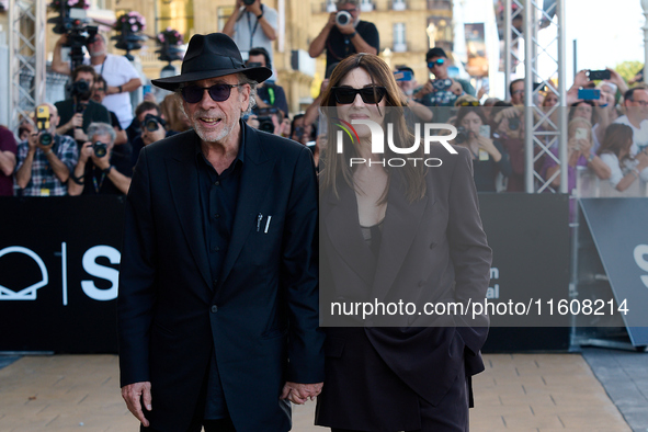 Monica Bellucci and Tim Burton arrive at the Maria Cristina Hotel during the 72nd San Sebastian International Film Festival in San Sebastian...