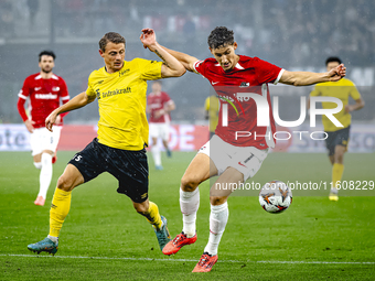 Elfsborg midfielder Simon Hedlund and AZ Alkmaar forward Ruben van Bommel during the match AZ vs. Elfsborg at the AZ Stadium for the UEFA Eu...