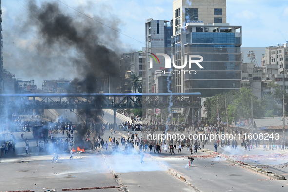 Students clash with the police during an ongoing anti-quota protest in Dhaka, Bangladesh, on July 19, 2024. Police in Bangladesh's capital b...