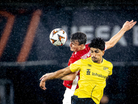 AZ Alkmaar midfielder Peer Koopmeiners and IF Elfsborg midfielder Ahmed Qasem during the match AZ - Elfsborg at the AZ Stadium for the UEFA...