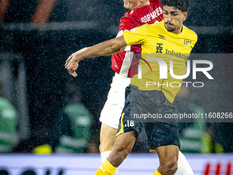 AZ Alkmaar midfielder Peer Koopmeiners and IF Elfsborg midfielder Ahmed Qasem during the match AZ - Elfsborg at the AZ Stadium for the UEFA...