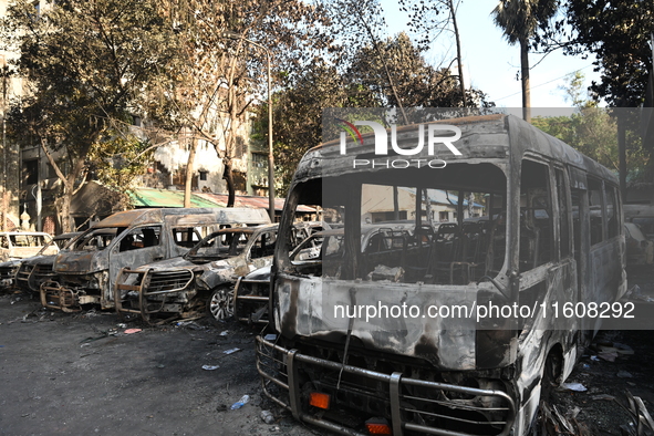 Burnt vehicles are seen after students set them on fire amid the ongoing anti-quota protest in Dhaka, Bangladesh, on July 19, 2024. Police i...