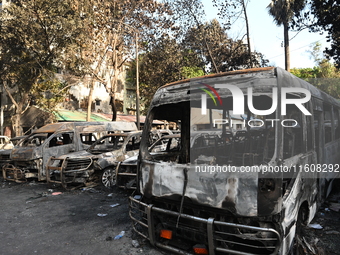 Burnt vehicles are seen after students set them on fire amid the ongoing anti-quota protest in Dhaka, Bangladesh, on July 19, 2024. Police i...