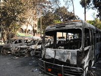 Burnt vehicles are seen after students set them on fire amid the ongoing anti-quota protest in Dhaka, Bangladesh, on July 19, 2024. Police i...