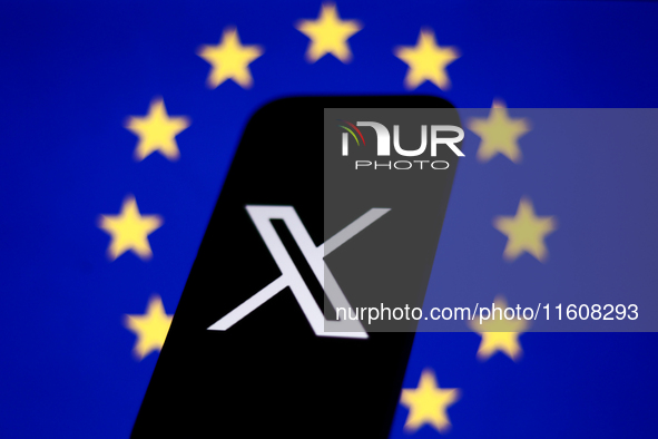 European Union flag displayed on a laptop screen and X logo displayed on a phone screen are seen in this illustration photo taken in Krakow,...