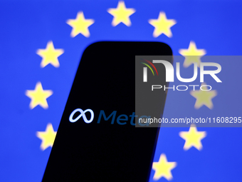 European Union flag displayed on a laptop screen and Meta logo displayed on a phone screen are seen in this illustration photo taken in Krak...