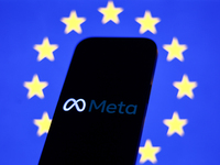 European Union flag displayed on a laptop screen and Meta logo displayed on a phone screen are seen in this illustration photo taken in Krak...