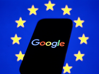 European Union flag displayed on a laptop screen and Google logo displayed on a phone screen are seen in this illustration photo taken in Kr...