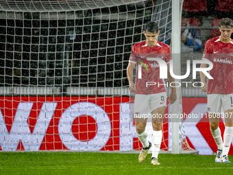 AZ Alkmaar forward Troy Parrot and AZ Alkmaar midfielder Sven Mijnans during the match between AZ Alkmaar and Elfsborg at the AZ Stadium for...