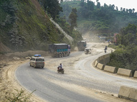 Due to the expansion of Prithvi Highway, passengers suffer from dust pollution while traveling on Prithvi Highway in Dhading, Nepal, on Sept...