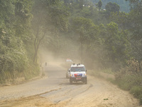 Due to the expansion of Prithvi Highway, passengers suffer from dust pollution while traveling on Prithvi Highway in Dhading, Nepal, on Sept...