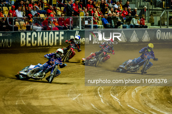 Marcel Kowolik, Maciej Janowski, and Jakub Miskowiak participate in a PGE Speedway Ekstraliga game between Sparta Wroclaw and Stal Gorzow Wi...