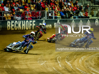 Marcel Kowolik, Maciej Janowski, and Jakub Miskowiak participate in a PGE Speedway Ekstraliga game between Sparta Wroclaw and Stal Gorzow Wi...