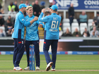 England's Jacob Bethell (center) celebrates taking the wicket of Australia's Cameron Green during the Metro Bank One Day Series match betwee...