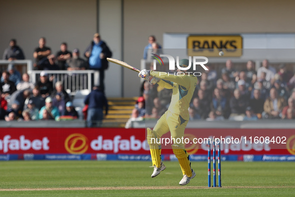 Alex Carey of Australia swings and misses at a short-pitched ball during the Metro Bank One Day Series match between England and Australia a...