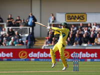 Alex Carey of Australia swings and misses at a short-pitched ball during the Metro Bank One Day Series match between England and Australia a...