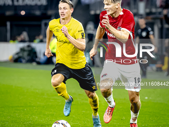 Elfsborg midfielder Simon Hedlund and AZ Alkmaar defender David Moller Wolfe during the match AZ - Elfsborg at the AZ Stadium for the UEFA E...