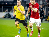 Elfsborg midfielder Simon Hedlund and AZ Alkmaar defender David Moller Wolfe during the match AZ - Elfsborg at the AZ Stadium for the UEFA E...