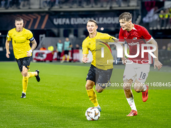 Elfsborg midfielder Simon Hedlund and AZ Alkmaar defender David Moller Wolfe during the match AZ - Elfsborg at the AZ Stadium for the UEFA E...