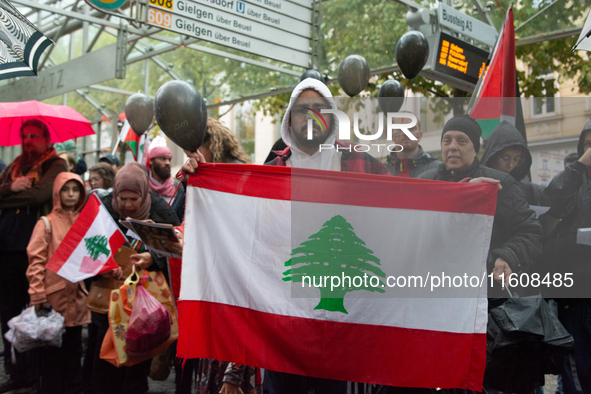 A hundred pro-Palestinian activists gather to protest against Israeli attacks on Lebanon and Gaza in Bonn, Germany, on September 25, 2024. 