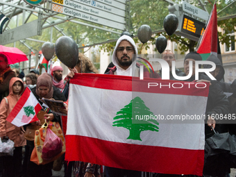 A hundred pro-Palestinian activists gather to protest against Israeli attacks on Lebanon and Gaza in Bonn, Germany, on September 25, 2024. (