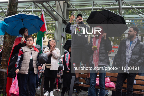 A hundred pro-Palestinian activists gather to protest against Israeli attacks on Lebanon and Gaza in Bonn, Germany, on September 25, 2024. 