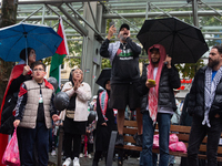 A hundred pro-Palestinian activists gather to protest against Israeli attacks on Lebanon and Gaza in Bonn, Germany, on September 25, 2024. (