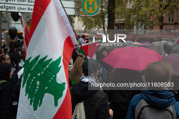 A hundred pro-Palestinian activists gather to protest against Israeli attacks on Lebanon and Gaza in Bonn, Germany, on September 25, 2024. 