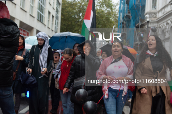 A hundred pro-Palestinian activists gather to protest against Israeli attacks on Lebanon and Gaza in Bonn, Germany, on September 25, 2024. 