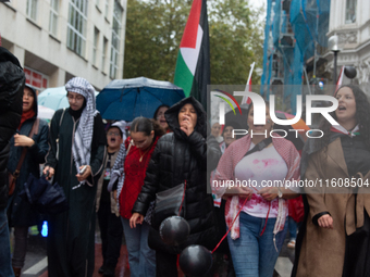 A hundred pro-Palestinian activists gather to protest against Israeli attacks on Lebanon and Gaza in Bonn, Germany, on September 25, 2024. (