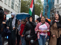 A hundred pro-Palestinian activists gather to protest against Israeli attacks on Lebanon and Gaza in Bonn, Germany, on September 25, 2024. (