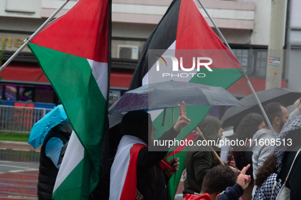 A hundred pro-Palestinian activists gather to protest against Israeli attacks on Lebanon and Gaza in Bonn, Germany, on September 25, 2024. 