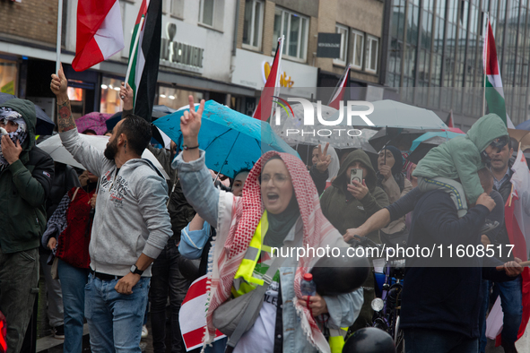 A hundred pro-Palestinian activists gather to protest against Israeli attacks on Lebanon and Gaza in Bonn, Germany, on September 25, 2024. 