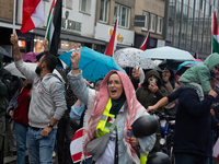 A hundred pro-Palestinian activists gather to protest against Israeli attacks on Lebanon and Gaza in Bonn, Germany, on September 25, 2024. (