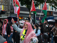 A hundred pro-Palestinian activists gather to protest against Israeli attacks on Lebanon and Gaza in Bonn, Germany, on September 25, 2024. (