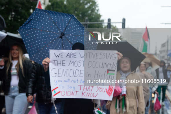 A hundred pro-Palestinian activists gather to protest against Israeli attacks on Lebanon and Gaza in Bonn, Germany, on September 25, 2024. 