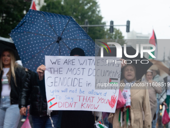 A hundred pro-Palestinian activists gather to protest against Israeli attacks on Lebanon and Gaza in Bonn, Germany, on September 25, 2024. (