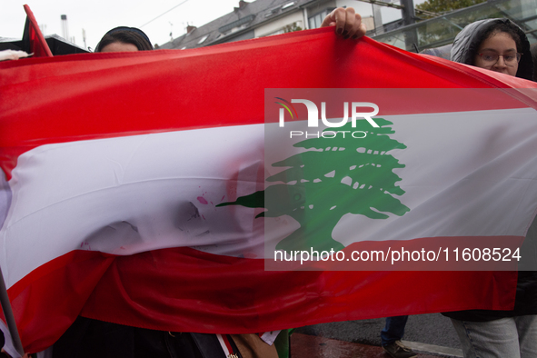 A hundred pro-Palestinian activists gather to protest against Israeli attacks on Lebanon and Gaza in Bonn, Germany, on September 25, 2024. 