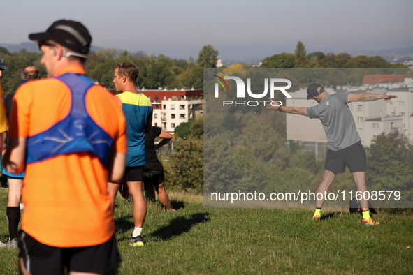 Competitors prepare for the race during the 17th PKO Three Mounds Run on the Krakus Mound in Krakow, Poland, on September 22, 2024. The Thre...