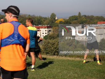 Competitors prepare for the race during the 17th PKO Three Mounds Run on the Krakus Mound in Krakow, Poland, on September 22, 2024. The Thre...