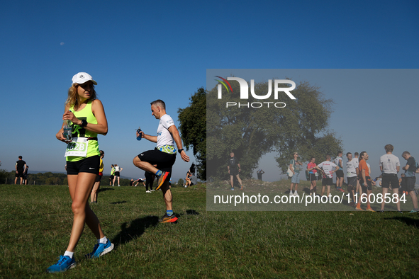 Competitors prepare for the race during the 17th PKO Three Mounds Run on the Krakus Mound in Krakow, Poland, on September 22, 2024. The Thre...