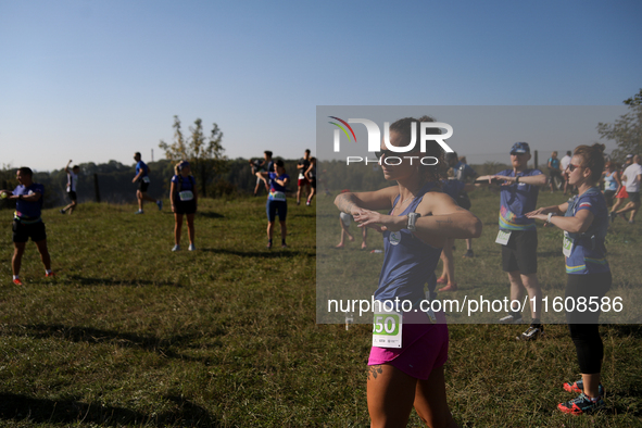 Competitors prepare for the race during the 17th PKO Three Mounds Run on the Krakus Mound in Krakow, Poland, on September 22, 2024. The Thre...