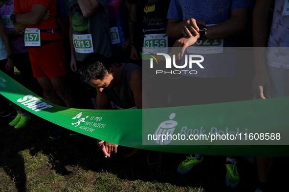 Competitors prepare for the race during the 17th PKO Three Mounds Run on the Krakus Mound in Krakow, Poland, on September 22, 2024. The Thre...