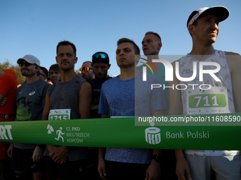 Competitors prepare for the race during the 17th PKO Three Mounds Run on the Krakus Mound in Krakow, Poland, on September 22, 2024. The Thre...