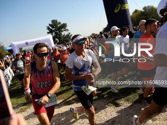 Competitors run during the 17th PKO Three Mounds Run on the Krakus Mound in Krakow, Poland, on September 22, 2024. The Three Mounds Run has...