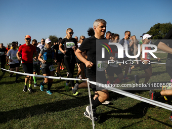 Competitors run during the 17th PKO Three Mounds Run on the Krakus Mound in Krakow, Poland, on September 22, 2024. The Three Mounds Run has...