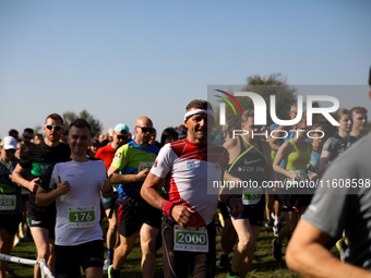 Competitors run during the 17th PKO Three Mounds Run on the Krakus Mound in Krakow, Poland, on September 22, 2024. The Three Mounds Run has...